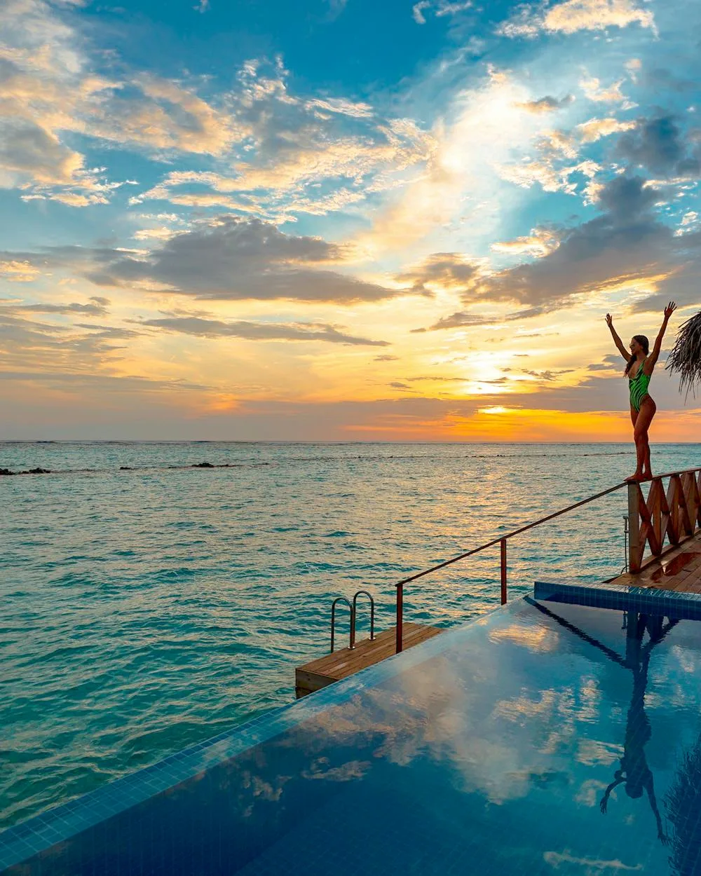 Wide white-sand beach and turquoise Caribbean water at Sun Palace Cancun, adults-only resort at Km 20